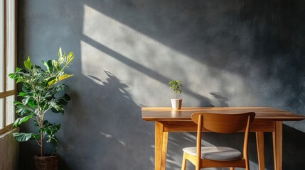 Room with gray wall, wood table, and basic chair