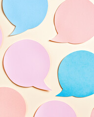 Colorful speech bubbles in pastel shades create playful and inviting atmosphere, perfect for communication and expression