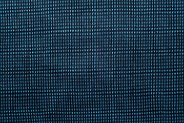 Texture of dense blue fabric for tailoring. Canvas. Textile. Textile