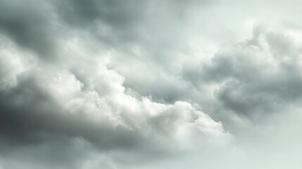 A soft gray sky is filled with gentle clouds, evoking a peaceful ambiance perfect for quiet contemplation. The calm day inspires thoughts of tranquility and stillness