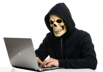 A man with a skull mask and hoodie sits at a laptop, concentrating on the task at hand.