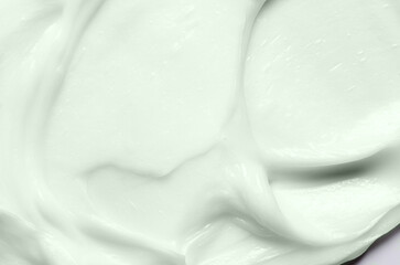 The texture of a cosmetic cream or balm