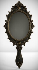 Ornate antique hand-held mirror