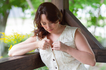 Beautiful flirtatious woman in the gazebo