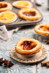 Traditional Portuguese custard tarts or Pastel de Nata freshly baked cream dessert. High quality photo