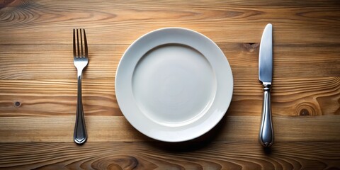 A lonely fork lies on a clean empty plate beside a sharp knife, kitchen, flatware,  kitchen, flatware,fork, eating, empty space