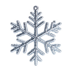 A glittering silver snowflake with intricate designs and a central hole for hanging