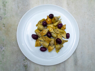 Portion of artichoke hearts and olives