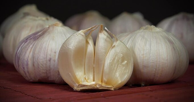 Garlic, Allium sativum, species of bulbous flowering plants in genus Allium. Garlic - very healthy product with many beneficial properties. Its close relatives include onion, shallot, leek