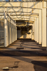 The view of the roof during the sunset time. A passage on the roof. Outdoor scene.
