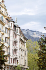 houses in the city mountains background