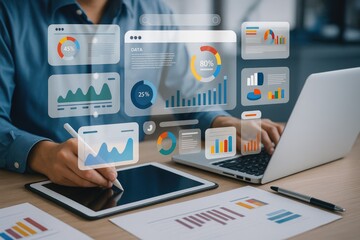 Businessman analyzing data charts graphs on tablet laptop