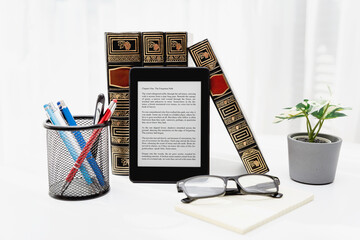 E-book reader device in home library