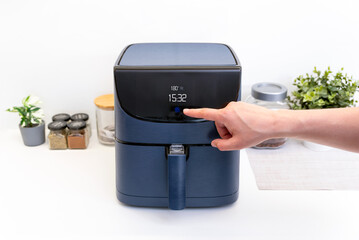 Air fryer machine in the kitchen