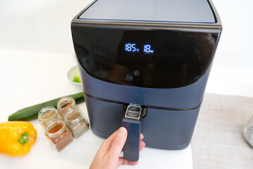 Air fryer machine in the kitchen