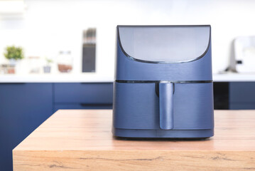 Air fryer machine in the kitchen