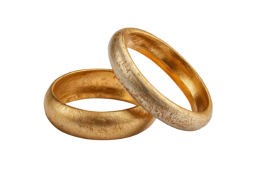 PNG Two rustic gold wedding bands on black background
