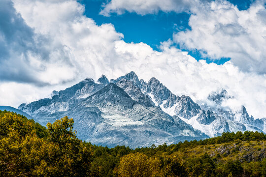 Snow-capped mountains under a clear sky