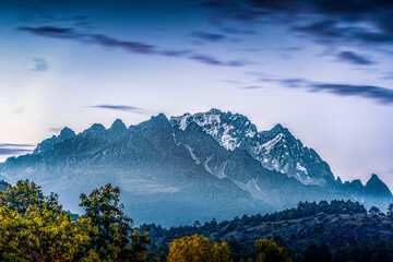 Jade Dragon Snow Mountain in Lijiang, Yunnan Province, China, under the night sky
