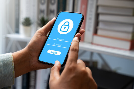 Man using smartphone to encrypt data and strengthen cybersecurity, Protecting personal and corporate information against hackers. Data privacy, Safe internet technology practices...