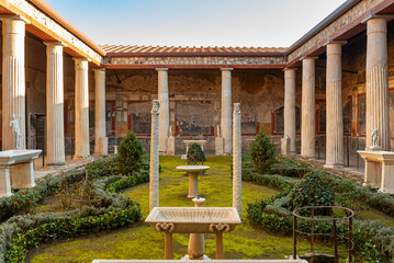 The House of the Vettii, with its garden and peristyle, is located in Pompeii, Italy. It is one of the city's largest domus. It features an extensive collection of Fourth-Style frescoes.