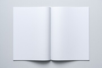 A photorealistic open magazine with blank pages on a light background, centered and softly lit