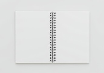 Opened notebook with blank pages and spiral binding