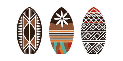 Three surfboards with traditional Hawaiian patterns and colors  