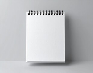 Blank Spiral Notepad on Gray Background