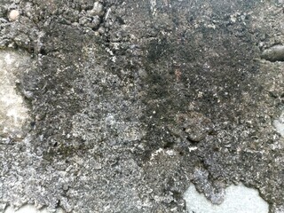 Rough Concrete Wall with Natural Erosion Texture. Closeup of rough, aged concrete wall with natural...