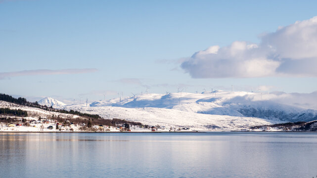 Serene winter landscape with wind turbines in Norway - Powered by Adobe
