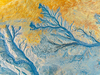 Abstract fractal patterns in blue and yellow hues