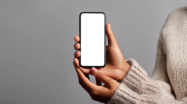 male hands holding a phone with a blank screen