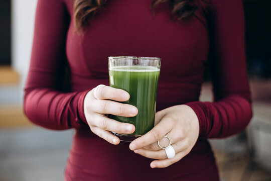 Student enjoying a healthy green drink - Powered by Adobe