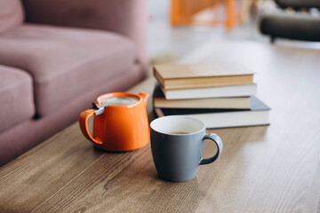 Cozy reading nook with tea and books