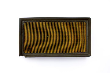 A dirty SUV car air filter isolated on white background. It purify the air entering the engine, preventing dirt, dust, and other contaminants from harming the engine's components.