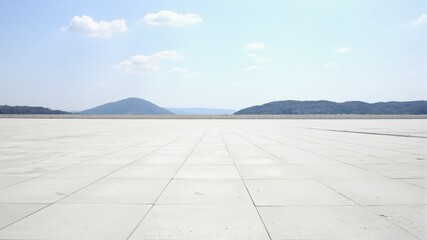  Vast Open Plain Under Clear Sky with Distant Mountains