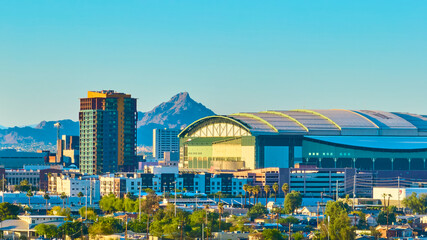 Aerial Phoenix Downtown Skyline with High Rise Stadium and Mountain Golden Hour