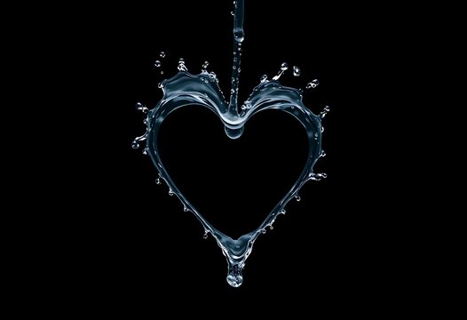 Water splash shaped like a heart on dark background