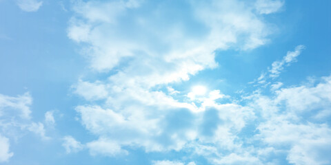 Obraz premium Blue soft sky clouds, light bright sunny, crystal effect background image, a storm canvas, Fresh air weather atmosphere, sunlight, landscape