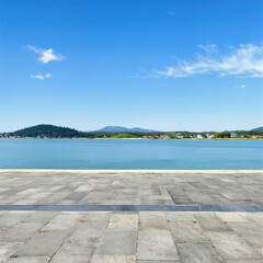  Serene Lake View with Clear Sky and Distant Mountains