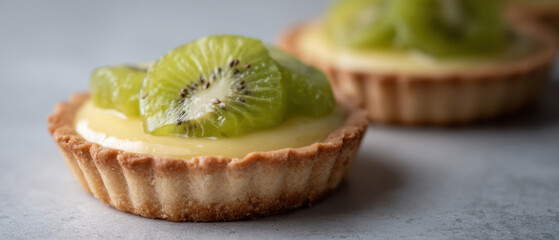 Kiwi fruit tartlet with creamy custard on pastry base