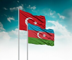  National flags of Turkey and Azerbaijan wave side by side in a clear blue sky symbolizing...