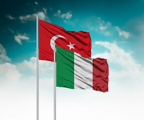  National flags of Turkey and Italy wave side by side in a clear blue sky symbolizing international...