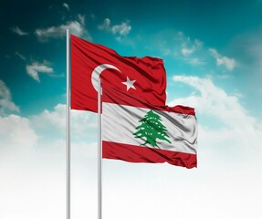  National flags of Turkey and Lebanon wave side by side in a clear blue sky symbolizing...