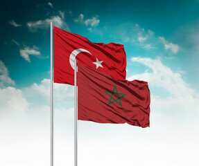  National flags of Turkey and Morocco wave side by side in a clear blue sky symbolizing...