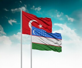 National flags of Turkey and Uzbekistan wave side by side in a clear blue sky symbolizing...