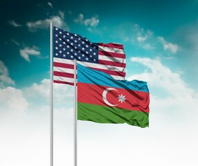  National flags of United States of America and Azerbaijan wave side by side in a clear blue sky...
