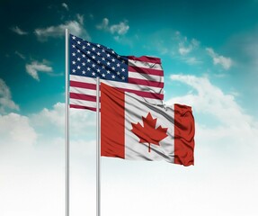  National flags of United States of America and Canada wave side by side in a clear blue sky...