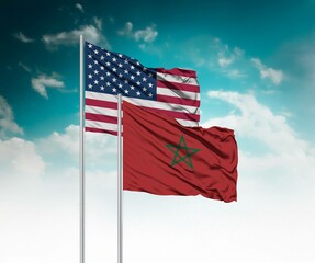  National flags of United States of America and Morocco wave side by side in a clear blue sky symbolizing international unity and cooperation.